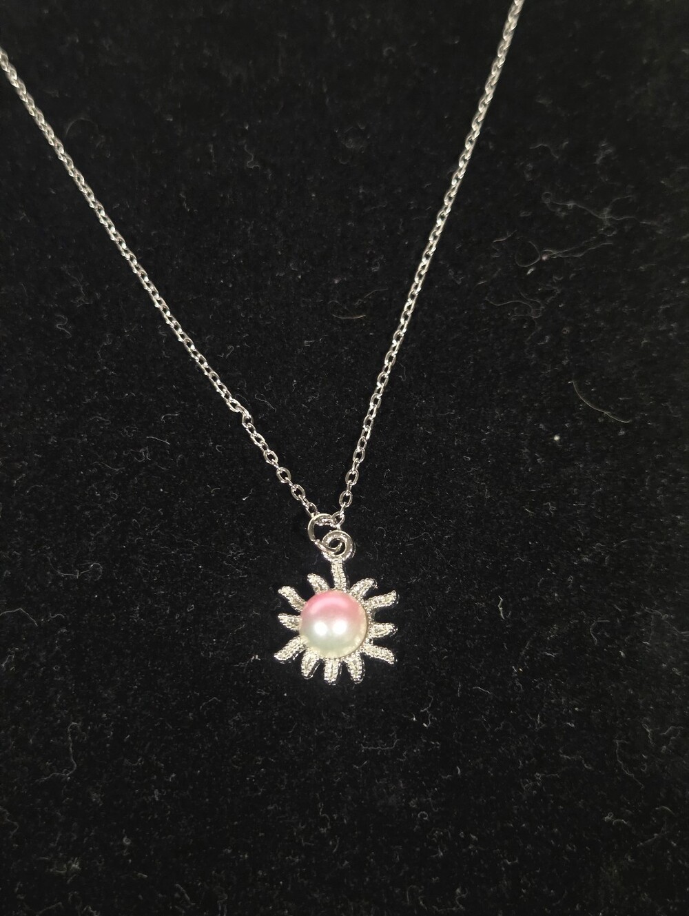Handcrafted Silver Sunburst Pendant Necklace with Pink Pearl Accent